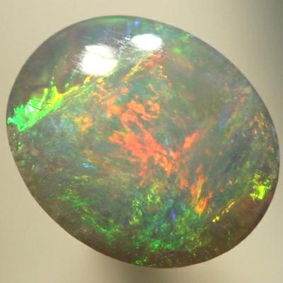 SOLID SEMI BLACK OPAL Central orange colour patch surrounded by green, all bright